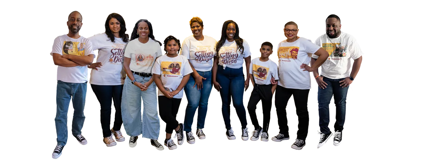 The ShelettaMakesMeLaugh podcast hosts standing together in branded T-shirts.